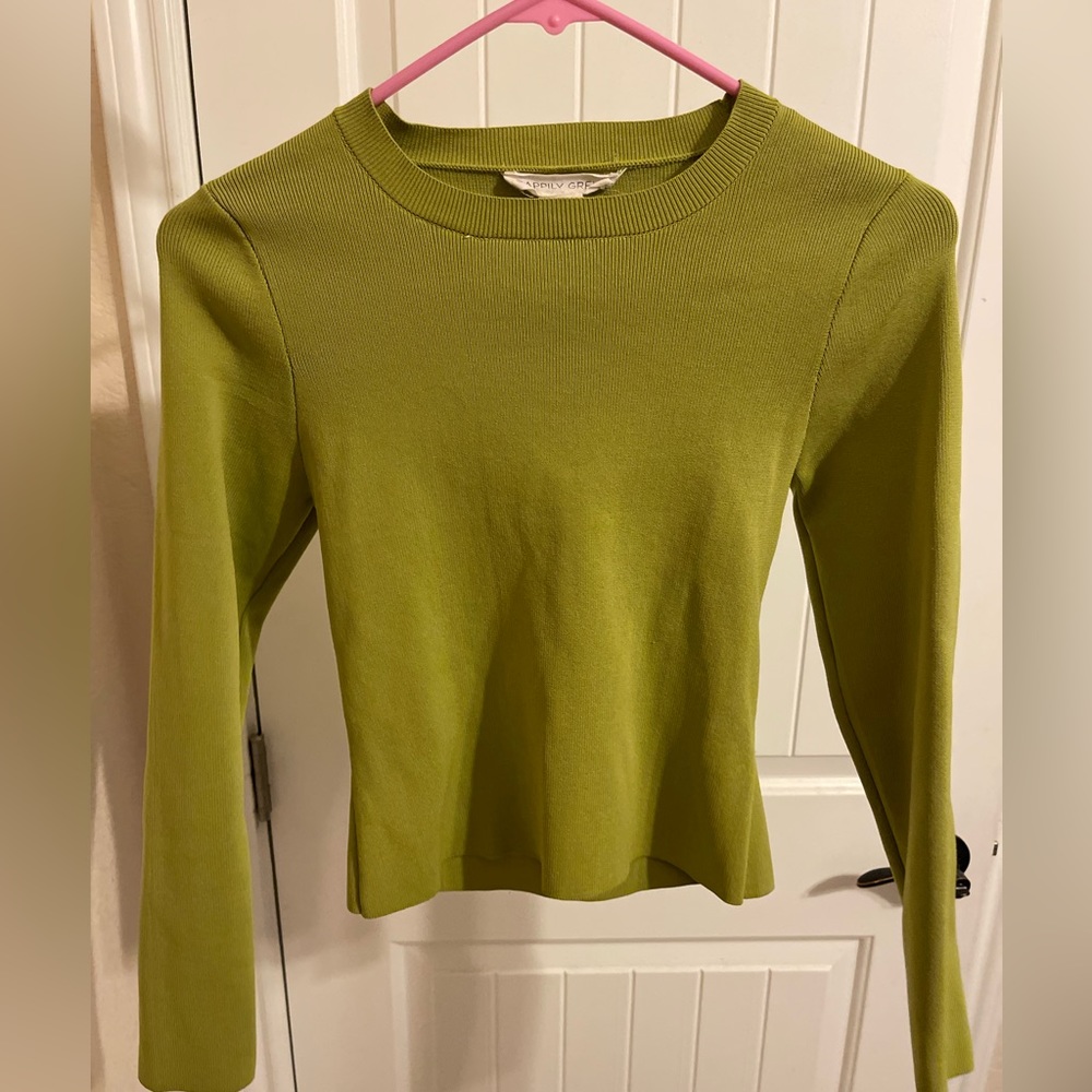Green long sleeve top.